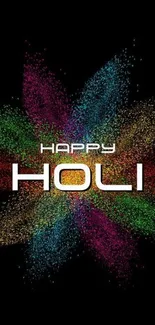 Happy Holi wallpaper with colorful powder burst on black background.