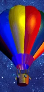 Vibrant hot air balloon floats against a night sky.