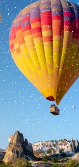 Vibrant hot air balloons under a clear blue sky.