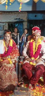 Indian wedding couple with vibrant decor.