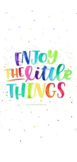 Inspirational wallpaper with colorful quote 'Enjoy the Little Things' on a white background.