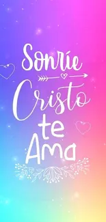 Vibrant mobile wallpaper with 'Sonríe Cristo te Ama' in Spanish on gradient background.