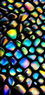 Colorful iridescent stones forming abstract pattern on black background.