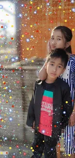 Kids with colorful sparkles in the background.