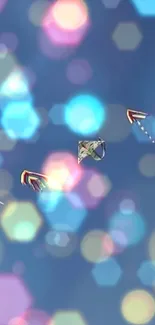 Colorful kites fly against a blue sky with bokeh lights.