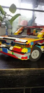 A colorful LEGO car made from multicolored bricks.