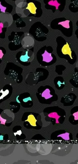 Leopard print wallpaper, colorful spots on black.