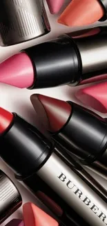 Colorful arrangement of lipsticks for mobile wallpaper.