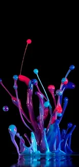 Vibrant neon liquid splash on black background for mobile wallpaper.