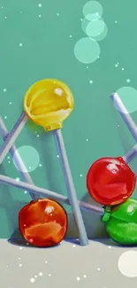 Colorful lollipops against turquoise background wallpaper.