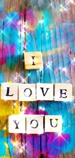 Colorful 'I Love You' wallpaper with wooden tiles and sparkles.