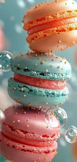 Stack of pastel macarons with bubbles, creating a colorful and whimsical design.