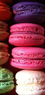 Vibrant mobile wallpaper featuring colorful macarons in various shades.