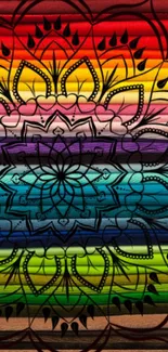 Colorful mandala pattern with rainbow stripes in background.