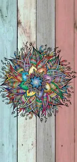 Colorful mandala with rustic wood background wallpaper.