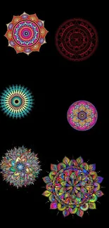 Vibrant mobile wallpaper with colorful mandalas on a black background.