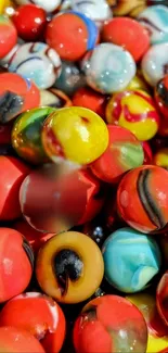 Close-up of colorful marbles with various vibrant patterns.