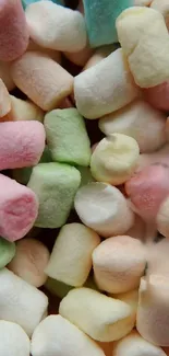 Colorful marshmallows in pastel hues as a phone wallpaper.