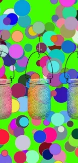 Colorful mason jars with polka dots on bright green wallpaper.