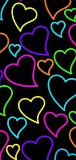 Colorful neon hearts on a black background wallpaper.