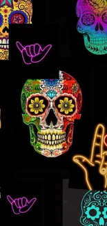 Colorful neon skulls on black wallpaper, featuring vibrant designs.