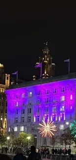 Beautiful night cityscape with colorful lights and iconic buildings.