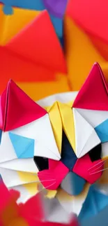 Vibrant origami cat art on a colorful background.