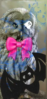 A colorful owl with a pink bow and black bat design on a branch.