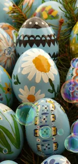 Colorful painted Easter eggs with floral and geometric designs on a blue background.