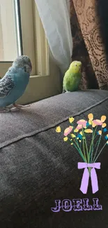 Colorful parrots sit on a couch with floral graphic and text overlay.