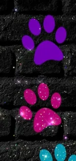 Colorful paw prints on a dark brick wall mobile wallpaper.