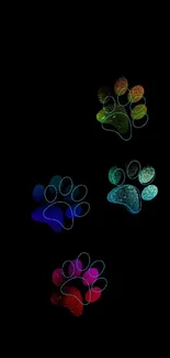 Colorful paw prints against a black background.