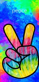 Colorful peace sign wallpaper with rainbow background.