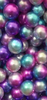 Colorful pearl balls in pink, blue, and purple hues.