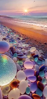 Colorful beach pebbles at sunset with ocean waves.