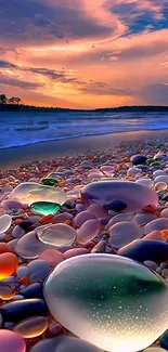 Vivid sunset over a pebble beach with colorful stones.