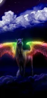 Colorful Pegasus with rainbow wings in a night sky with clouds.