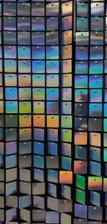 Array of colorful phone screens displaying vibrant patterns.