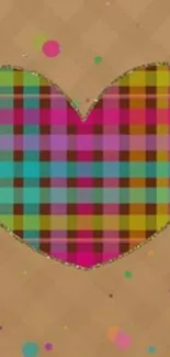 A colorful plaid heart on a brown background with scattered dots.