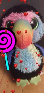 A colorful plush toy with a lollipop.