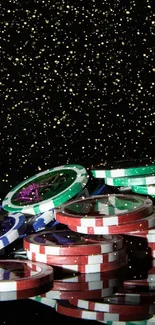 Colorful poker chips on a black background.