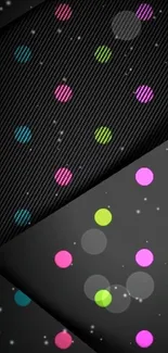 Colorful polka dot wallpaper on dark background.