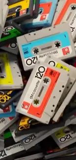 Mobile wallpaper with colorful retro cassette tapes.