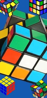 Colorful Rubik's Cube on blue background wallpaper.