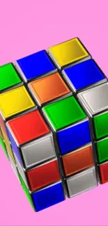 Colorful Rubik's Cube on a pink background wallpaper.