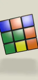 Floating Rubik's Cube with colorful tiles on a light beige background.