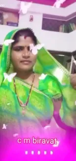 Woman in a green saree with butterfly animation.