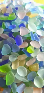 Colorful sea glass with blues, greens, and soft hues perfect for mobile wallpaper.