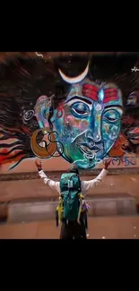 Colorful street art of Shiva with a backpacker's admiration.