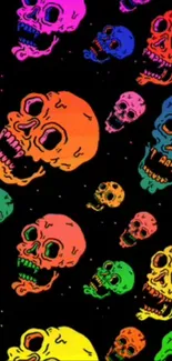 Colorful skulls on a black background creating an artistic wallpaper.